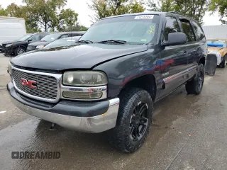 2003 GMC Yukon SLE with VIN 1GKEK13V33R298724, listed as a Copart auction lot 71219164 with 216,503 mi miles and Salvage Title. Bid and sale history available at carsss.com. Image 1.