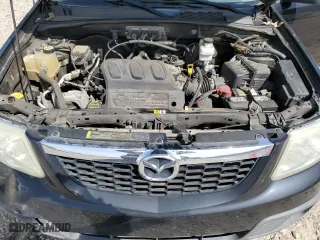 2008 Mazda Tribute ES with VIN 4F2CZ06118KM21700, listed as a Copart auction lot 50431615 with 229,544 mi miles and Salvage Title. Bid and sale history available at carsss.com. Image 12.