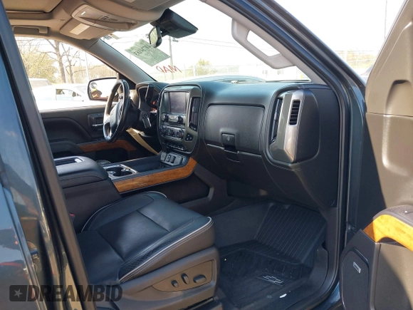 2018 Chevrolet Silverado 1500 High Country with VIN 3GCUKTEC8JG308353, listed as a IAAI auction lot 40714183 with 88,711 mi miles and . Bid and sale history available at DreamBid. Image 5.