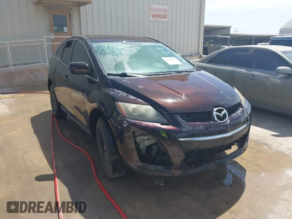 2010 Mazda CX-7 SV with VIN JM3ER2W50A0348738, listed as a IAAI auction lot 41703807 with 238,680 mi miles. Bid and sale history available at carsss.com. Image 1.