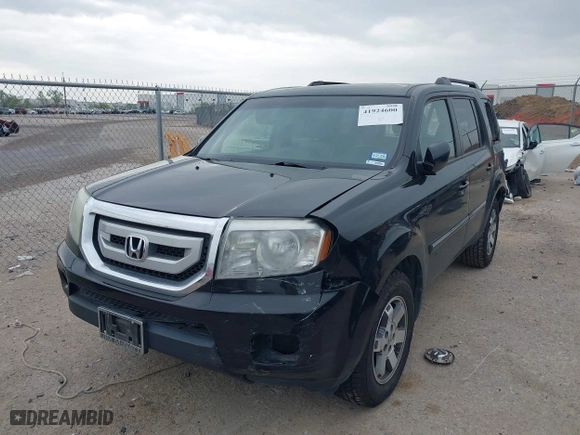 2009 Honda Pilot Touring with VIN 5FNYF388X9B024429, listed as a IAAI auction lot 41924600 with 125,400 mi miles. Bid and sale history available at carsss.com. Image 2.