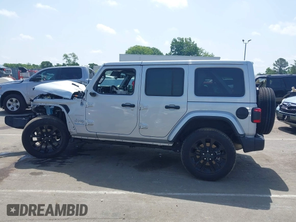 2024 Jeep Wrangler Sahara with VIN 1C4RJXP60RW292136, listed as a IAAI auction lot 42280063 with 26,701 mi miles and . Bid and sale history available at DreamBid. Image 14.