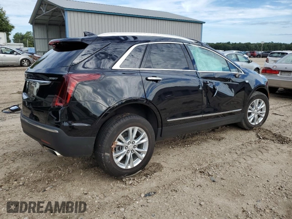 2023 Cadillac XT5 FWD Luxury z VIN 1GYKNAR40PZ106096, wystawiony jako Copart lot #80909074 z przebiegiem 19 677 mil mil oraz Nie do naprawy • Non repairable. Historia ofert i sprzedaży dostępna na DreamBid. Obrazek 3.
