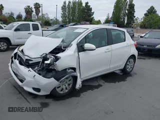 2012 Toyota Yaris L with VIN JTDKTUD38CD513912, listed as a IAAI auction lot 42131567 with 133,664 mi miles. Bid and sale history available at carsss.com. Image 2.