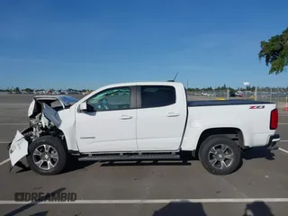 2017 Chevrolet Colorado 2WD Z71 z VIN 1GCGSDEN5H1305178, wystawiony jako IAAI lot #41986832 z przebiegiem 103 778 mil mil oraz . Historia ofert i sprzedaży dostępna na DreamBid. Obrazek 14.
