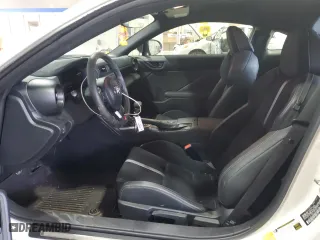 2023 Toyota GR86 Premium with VIN JF1ZNBE10P9765758, listed as a Copart auction lot 72064734 with 9,651 mi miles and Salvage Title. Bid and sale history available at carsss.com. Image 7.