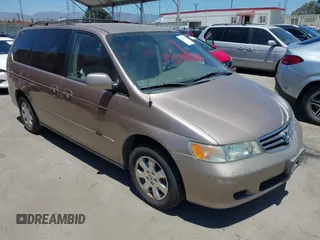 2003 Honda Odyssey EX-L with VIN 5FNRL18973B086033, listed as a IAAI auction lot 42620708 with 187,950 mi miles and . Bid and sale history available at DreamBid. Image 1.