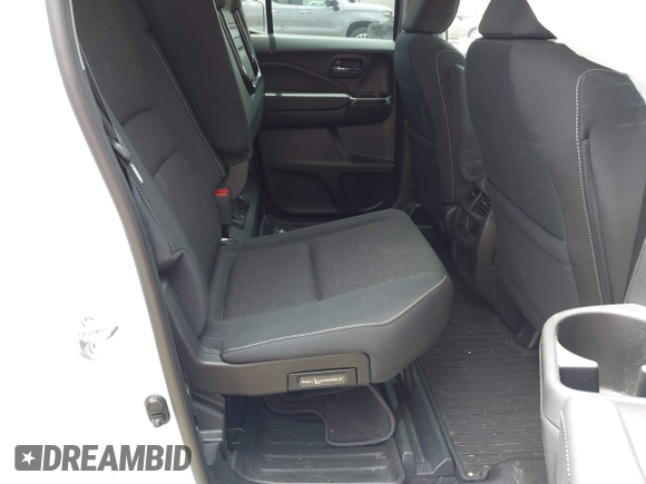 2021 Honda Ridgeline Sport with VIN 5FPYK3F14MB005117, listed as a IAAI auction lot 42343059 with 58,862 mi miles and . Bid and sale history available at DreamBid. Image 8.