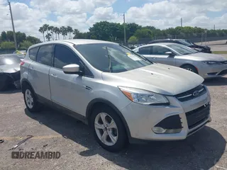 2016 Ford Escape SE z VIN 1FMCU0G75GUB56571, wystawiony jako IAAI lot #42172679 z przebiegiem 111 319 mil mil oraz . Historia ofert i sprzedaży dostępna na DreamBid. Obrazek 1.