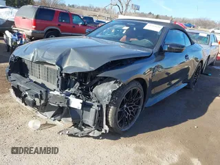 2022 BMW M4 Competition xDrive with VIN WBS33BA00NCJ63924, listed as a IAAI auction lot 41549620 with 9,046 mi miles. Bid and sale history available at carsss.com. Image 2.