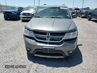 2012 Dodge Journey SXT z VIN 3C4PDDBG0CT345864, wystawiony jako Copart lot #55453875 z przebiegiem 142 444 mil mil oraz Szkoda całkowita • Salvage title. Historia ofert i sprzedaży dostępna na DreamBid. Obrazek 14.