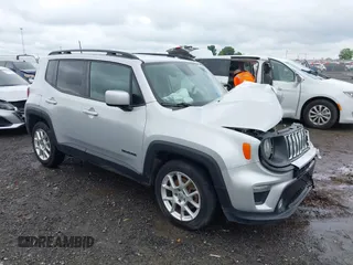 2019 Jeep Renegade Latitude z VIN ZACNJABB2KPJ73343, wystawiony jako IAAI lot #42338232 z przebiegiem 106 739 mil mil oraz . Historia ofert i sprzedaży dostępna na DreamBid. Obrazek 1.