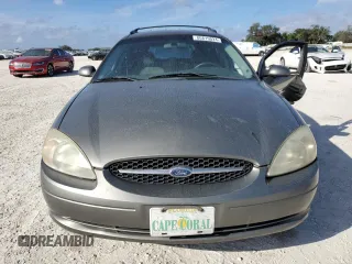 2003 Ford Taurus SE Standard with VIN 1FAFP58U33A259080, listed as a Copart auction lot 86819024 with 143,482 mi miles and Salvage Title. Bid and sale history available at carsss.com. Image 5.