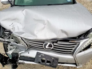 2015 Lexus RX 350 with VIN 2T2BK1BA5FC306653, listed as a Copart auction lot 60835795 with 128,574 mi miles and Salvage title. Bid and sale history available at DreamBid. Image 12.