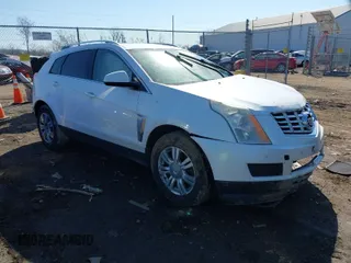 2016 Cadillac SRX Luxury Collection with VIN 3GYFNBE3XGS549454, listed as a IAAI auction lot 41758048 with 106,479 mi miles. Bid and sale history available at carsss.com. Image 1.