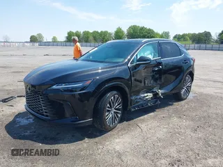 2024 Lexus RX 350 z VIN 2T2BAMBA1RC046647, wystawiony jako IAAI lot #42043636 z przebiegiem 2 595 mil mil oraz . Historia ofert i sprzedaży dostępna na DreamBid. Obrazek 17.