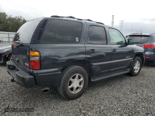 2004 GMC Yukon Denali with VIN 1GKEK63U34J116301, listed as a Copart auction lot 74930604 with 230,797 mi miles and Salvage Title. Bid and sale history available at carsss.com. Image 3.
