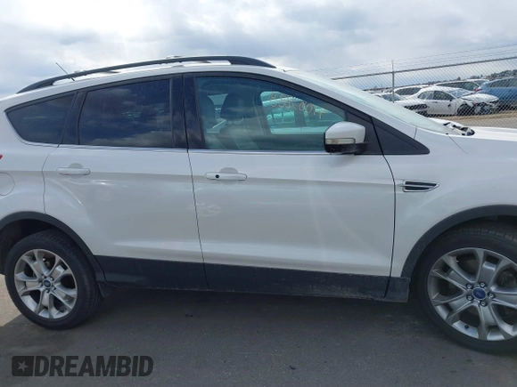 2013 Ford Escape SEL with VIN 1FMCU9H90DUD84350, listed as a IAAI auction lot 41883888 with 177,347 mi miles. Bid and sale history available at carsss.com. Image 13.