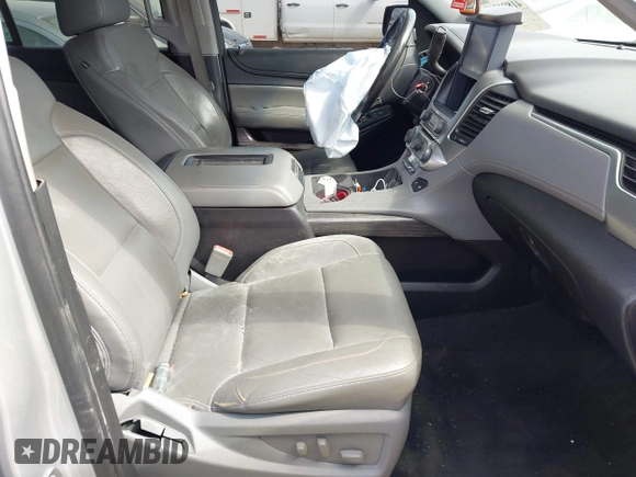 2015 Chevrolet Tahoe LT with VIN 1GNSCBKC4FR552034, listed as a IAAI auction lot 41891302 with 145,969 mi miles and . Bid and sale history available at DreamBid. Image 5.