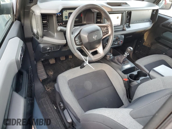 2022 Ford Bronco z VIN 1FMDE5AH6NLB71051, wystawiony jako Copart lot #77580794 z przebiegiem 20 904 mil mil oraz Szkoda całkowita • Salvage title. Historia ofert i sprzedaży dostępna na DreamBid. Obrazek 8.