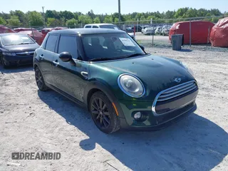 2015 MINI Hardtop 4 Door with VIN WMWXS5C56FT830225, listed as a IAAI auction lot 41996218 with 69,981 mi miles and . Bid and sale history available at DreamBid. Image 1.