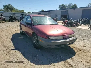 1998 Saturn SL z VIN 1G8ZH528XWZ144301, wystawiony jako Copart lot #75918414 z przebiegiem 219 256 mil mil oraz Szkoda całkowita • Salvage title. Historia ofert i sprzedaży dostępna na DreamBid. Obrazek 10.