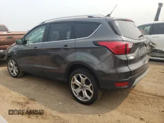 2019 Ford Escape Titanium with VIN 1FMCU9J98KUA56391, listed as a Copart auction lot 59215935 with 27,056 mi miles and Salvage title. Bid and sale history available at DreamBid. Image 2.