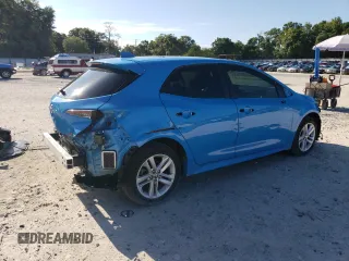 2021 Toyota Corolla Hatchback SE with VIN JTND4MBE5M3135173, listed as a Copart auction lot 60318104 with 55,308 mi miles and Salvage Title. Bid and sale history available at carsss.com. Image 3.