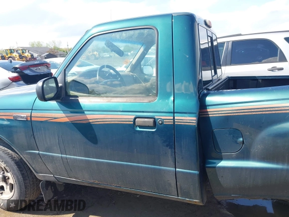 1998 Mazda B-Series Truck SX with VIN 4F4YR12C4WTM03287, listed as a IAAI auction lot 42182560 with 94,609 mi miles and . Bid and sale history available at DreamBid. Image 14.