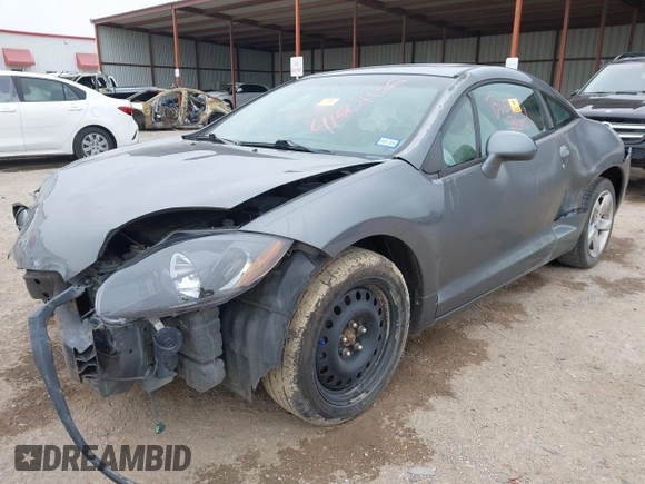 2006 Mitsubishi Eclipse GS z VIN 4A3AK24F06E044016, wystawiony jako IAAI lot #41501136 z przebiegiem Nie podano mil oraz . Historia ofert i sprzedaży dostępna na DreamBid. Obrazek 17.
