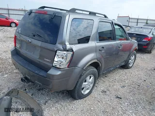 2009 Ford Escape XLT with VIN 1FMCU93G69KC27205, listed as a IAAI auction lot 40152013 with 187,084 mi miles. Bid and sale history available at carsss.com. Image 4.