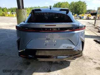 2023 Lexus RZ with VIN JTJAAAAB6PA002943, listed as a Copart auction lot 60852184 with 3,760 mi miles and Salvage Title. Bid and sale history available at carsss.com. Image 6.