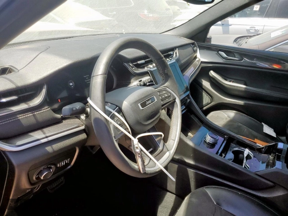 2023 Jeep Grand Cherokee Altitude with VIN 1C4RJKAGXP8736144, listed as a Copart auction lot 59230585 with 44,849 mi miles and Salvage title. Bid and sale history available at DreamBid. Image 7.