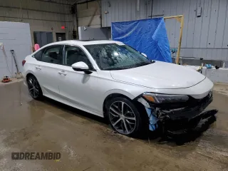 2022 Honda Civic Touring z VIN 2HGFE1F91NH313585, wystawiony jako Copart lot #56042115 z przebiegiem 30 954 mil mil oraz Szkoda całkowita • Salvage title. Historia ofert i sprzedaży dostępna na DreamBid. Obrazek 4.