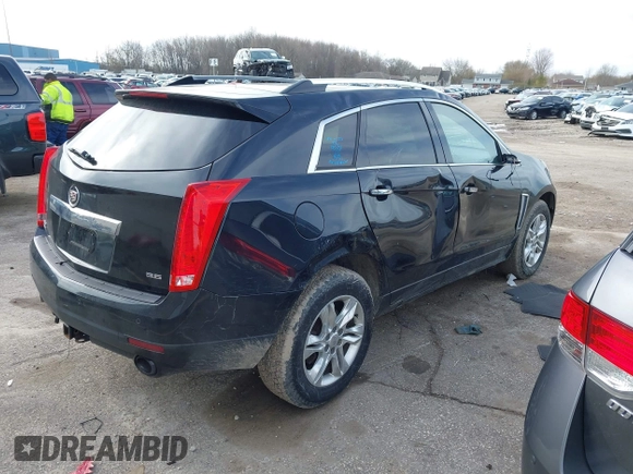 2013 Cadillac SRX Luxury Collection z VIN 3GYFNCE35DS607553, wystawiony jako IAAI lot #42151522 z przebiegiem 104 688 mil mil oraz . Historia ofert i sprzedaży dostępna na DreamBid. Obrazek 4.