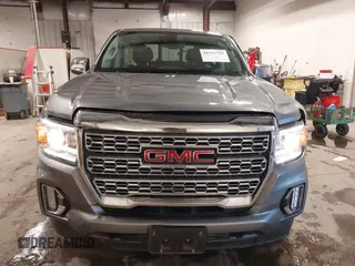 2021 GMC Canyon 4WD Denali with VIN 1GTG6EEN4M1287194, listed as a IAAI auction lot 41571729 with 21,704 mi miles. Bid and sale history available at carsss.com. Image 13.