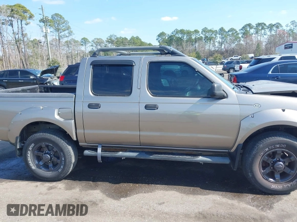 2004 Nissan Frontier XE with VIN 1N6ED27TX4C414670, listed as a IAAI auction lot 41504526 with 132,746 mi miles and . Bid and sale history available at DreamBid. Image 12.