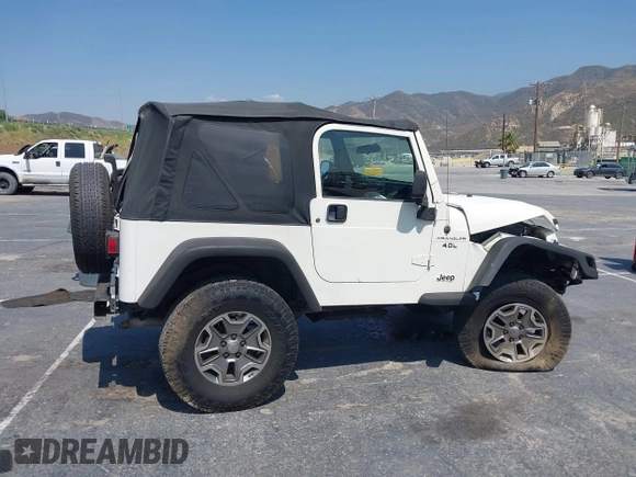 2003 Jeep Wrangler X with VIN 1J4FA39S73P321181, listed as a IAAI auction lot 42462732 with 170,460 mi miles and . Bid and sale history available at DreamBid. Image 14.
