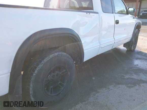 1998 Dodge Dakota SLT with VIN 1B7GL22Y6WS686210, listed as a IAAI auction lot 41184877 with 152,555 mi miles and . Bid and sale history available at DreamBid. Image 6.