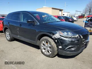 2014 Mazda CX-9 Touring z VIN JM3TB3CA4E0437589, wystawiony jako Copart lot #46572515 z przebiegiem 143 759 mil mil oraz Szkoda całkowita • Salvage title. Historia ofert i sprzedaży dostępna na DreamBid. Obrazek 4.