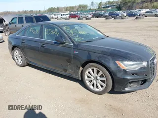2013 Audi A6 Prestige z VIN WAUHGAFC6DN061185, wystawiony jako IAAI lot #42041086 z przebiegiem Nie podano mil oraz . Historia ofert i sprzedaży dostępna na DreamBid. Obrazek 12.
