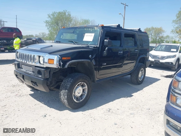 2005 Hummer H2 SUV with VIN 5GRGN23U25H128791, listed as a IAAI auction lot 42115436 with 286,818 mi miles. Bid and sale history available at carsss.com. Image 2.