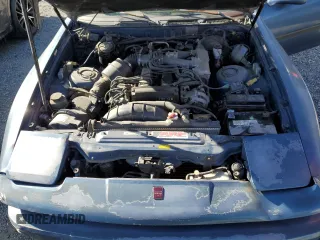 1986 Toyota Supra z VIN JT2MA70L2G0012221, wystawiony jako Copart lot #87328804 z przebiegiem 142 252 mil mil oraz Szkoda całkowita • Salvage title. Historia ofert i sprzedaży dostępna na DreamBid. Obrazek 11.