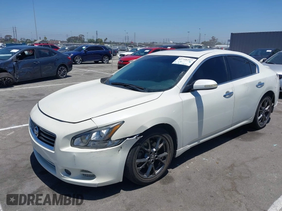 2014 Nissan Maxima SV with VIN 1N4AA5AP4EC907890, listed as a IAAI auction lot 42710257 with 125,659 mi miles and . Bid and sale history available at DreamBid. Image 2.