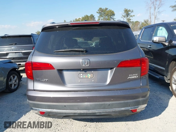 2016 Honda Pilot Elite with VIN 5FNYF6H01GB050555, listed as a IAAI auction lot 41670197 with 140,000 mi miles. Bid and sale history available at carsss.com. Image 16.