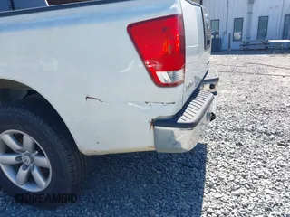 2008 Nissan Titan XE with VIN 1N6BA06C38N351875, listed as a IAAI auction lot 42060102 with 174,337 mi miles and . Bid and sale history available at DreamBid. Image 6.