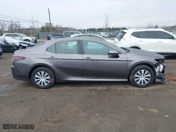 2021 Toyota Camry Hybrid LE with VIN 4T1C31AK4MU557997, listed as a IAAI auction lot 41863503 with 121,270 mi miles. Bid and sale history available at carsss.com. Image 14.