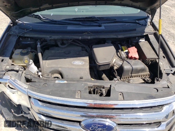 2013 Ford Edge Limited z VIN 2FMDK4KC8DBA83316, wystawiony jako Copart lot #58051895 z przebiegiem 158 795 mil mil oraz Szkoda całkowita • Salvage title. Historia ofert i sprzedaży dostępna na DreamBid. Obrazek 11.