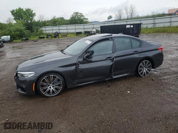 2020 BMW 5 Series M550i xDrive with VIN WBAJS7C06LCD12779, listed as a Copart auction lot 61136215 with 81,286 mi miles and Salvage title. Bid and sale history available at DreamBid. Image 1.