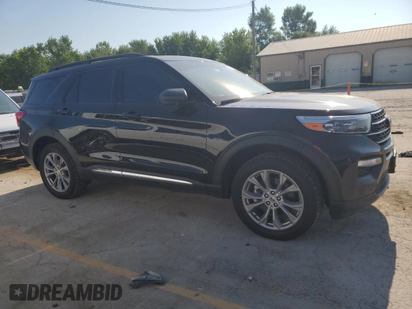 2023 Ford Explorer XLT with VIN 1FMSK8DH7PGB08372, listed as a Copart auction lot 62395205 with 63,257 mi miles and Salvage title. Bid and sale history available at DreamBid. Image 4.